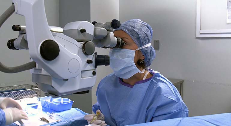Female Physician performing miloop state of the art cataract laser surgery at New York Eye and Ear Infirmary of New York